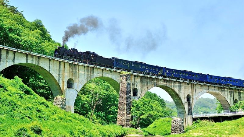 The SL Ginga crossing the Miyamorigawa Bridge. (Image credit: JR East)